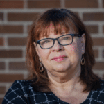 A portrait headshot of Darla Stuart, a member of our AmeriCorps program hosted at Tepeyac Community Health Center.